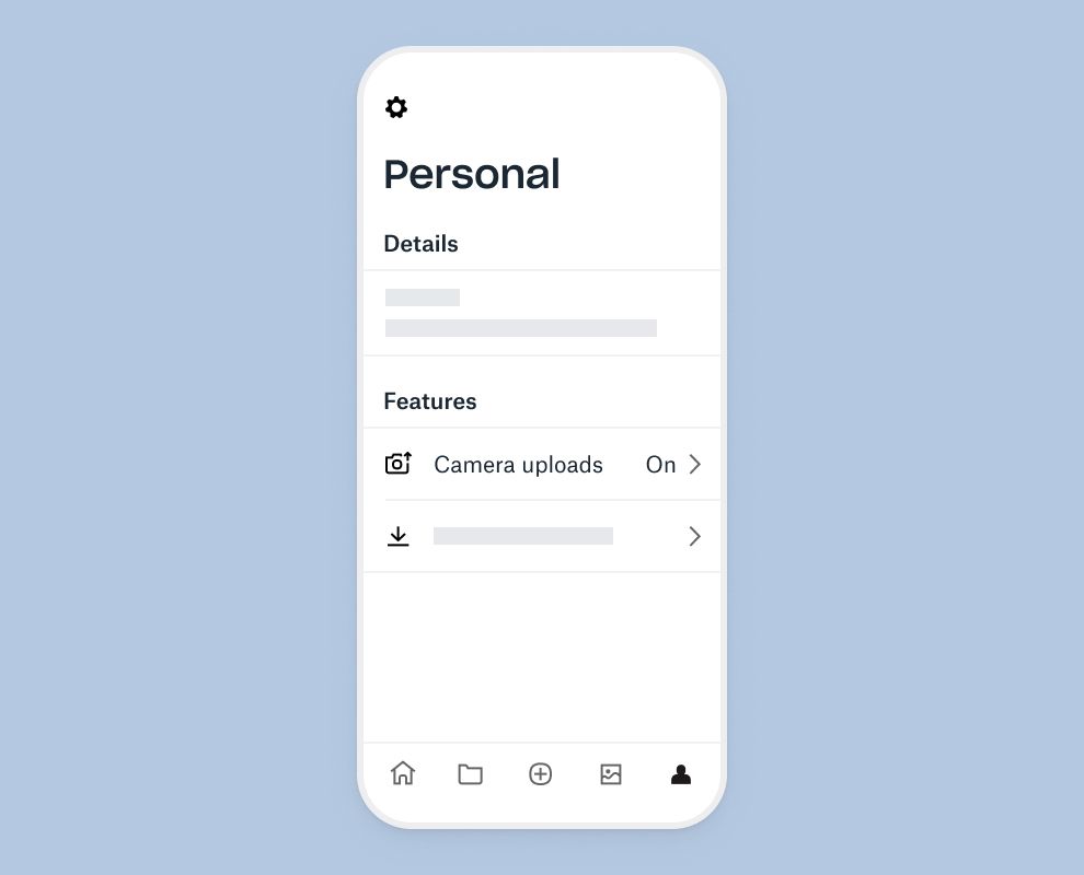 A user turning on the camera uploads feature in the Dropbox mobile app